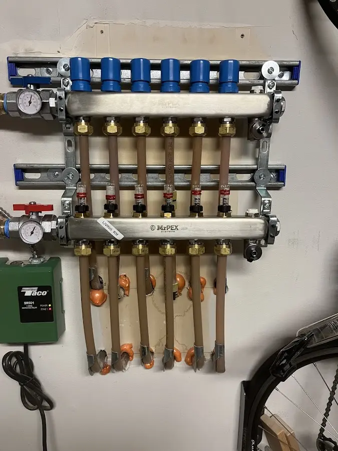 Plumber performing Leak Detection at a residential property in Aurora